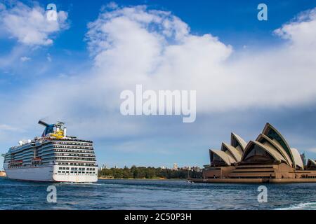 Sydney Australia Oct 14th 2019: the Sydney Opera house and the Spirit-class of cruise ship 'Carnival Spirit'. Stock Photo