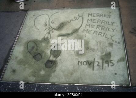 Hollywood, California, USA 2nd November 1995 A general view of atmosphere of actor Jim Carrey's hand and footprint s in cement at Jim Carrey Hand and Footprint ceremony on November 2, 1995 at Mann's Chinese Theatre in Hollywood, California, USA. Photo by Barry King/Alamy Stock Photo Stock Photo