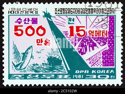 NORTH KOREA - CIRCA 1981: A stamp printed in North Korea shows Fishing and fabrics, circa 1981. Stock Photo
