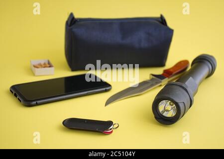 Emergency kit on yellow background Stock Photo
