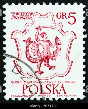 POLAND - CIRCA 1965: A stamp printed in Poland from the '700th anniversary of Warsaw' issue shows 17th century Arms of Warsaw, circa 1965. Stock Photo