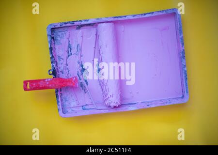 Pink pastel colored paint in tray shot from above Stock Photo