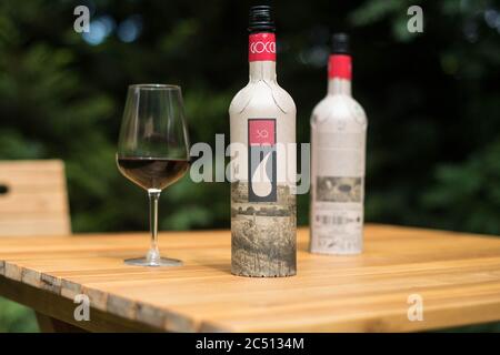 The Frugal wine bottle, from British packaging company Frugalpac, which has a lower carbon and water footprint than glass or plastic alternatives. The bottle is made from recycled paperboard with a recycled plastic food-grade liner to hold the wine or spirit. Stock Photo