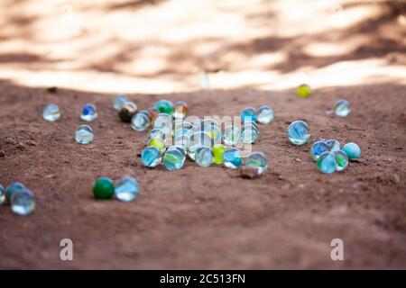 Glass Marbles on the road, Satara, Maharashra, India Stock Photo