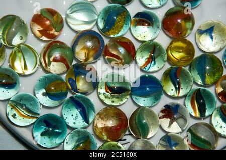 Handful of Red Marbles Stock Photo - Alamy