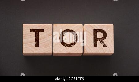 Tor anonymous by letters on a woden blocks on black. Business concept Stock Photo