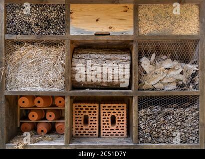 Large insect hotel with nine different compartments Stock Photo
