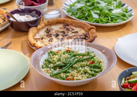 A table set for an al fresco lunch with friends Stock Photo