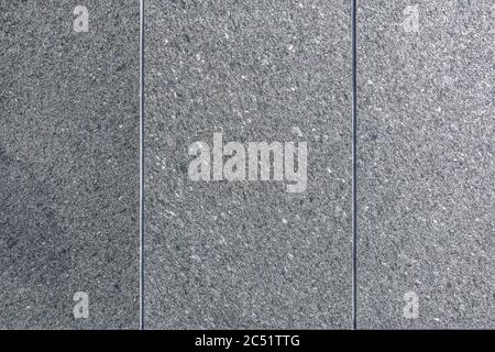Background rough grey concrete wall with vertical lines Stock Photo
