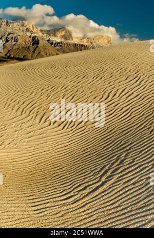 Salt Basin Dunes in front of western escarpment of snowcapped Guadalupe Mountains, sunset, Chihuahuan Desert, Guadalupe Mountains National Park, Texas Stock Photo