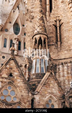 Sculptures and statues on the facade of the Sagrada Familia building. Stock Photo
