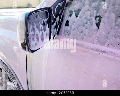 Woman in Pink Dress Washing Her Tiny Car with Nano Foam at Car Wash Stock  Image - Image of foam, auto: 250389741