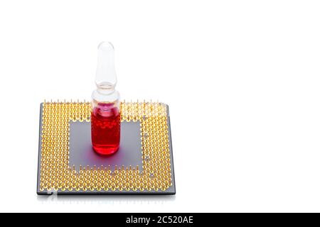 ampoule filled with a red medical product stands on a cpu processor with contact legs on theme of healthcare and cyberization technologies isolated on Stock Photo