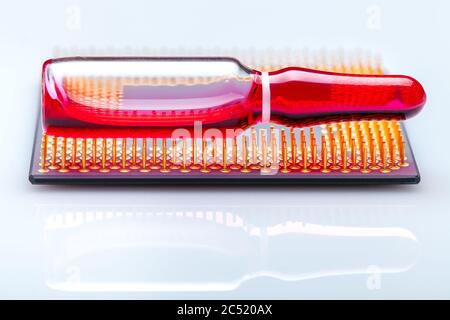 glass ampoule red medical fluid for vaccination implantation processor chip implantation for surveillance and total control and verification people, c Stock Photo
