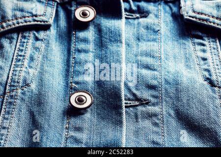 Vintage denim or blue jeans jacket. Close up view. Stock Photo