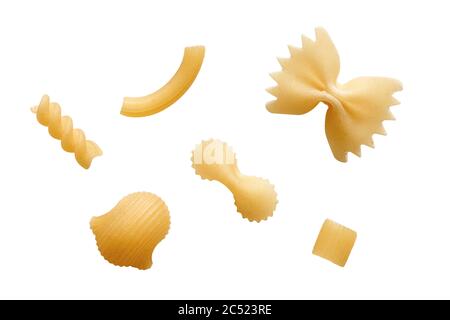 Various raw pasta isolated on white background. Farfalle, rotini, ziti rigati, pipette rigate; ditalini and farfalline. Stock Photo