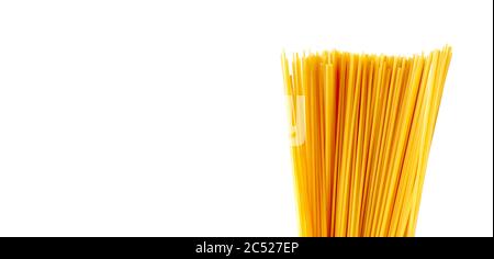 Uncooked raw spaghetti on isolated white background Stock Photo