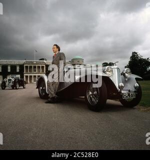 Charles Gordon- Lennox 11th Duke of Richmond driving his 1934 AC 16-80 Six sports car at Goodwood House UK  2002 Stock Photo