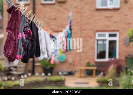 Unfashionable underwear lingerie pants knickers hanging out to dry on a  washing line Stock Photo - Alamy