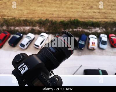 DSLR camera and tripod on a terrace, Bugibba, Malta Stock Photo