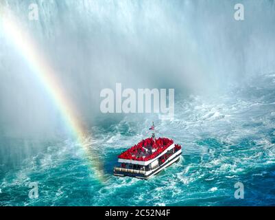 Rainbow over tourist boat, Niagara Falls, Ontario, Canada Stock Photo