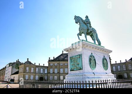 Amalienborg Palace Square with a statue of Frederick V on a horse. It is  the home of the Danish royal family, Copenhagen, Denmark. Stock Photo