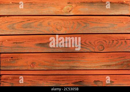 orange-pink wood texture with gray veins and knots Stock Photo