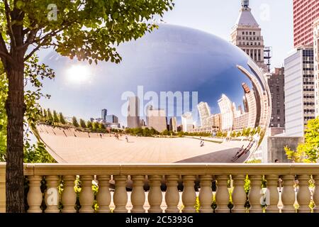 Chiago Skyline reflected in Cloud Gate including AON building and Millennium Park Stock Photo