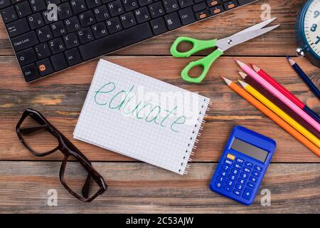 Educate accessories on a wooden desk. Stock Photo