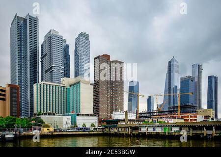 NYC, USA, May 2019, view from a pier by the Hudson River of the 12th Avenue with the Consulate General of the People's Republic of China building, Stock Photo