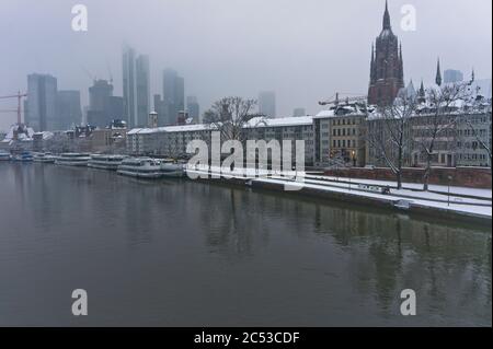 Snowy day, city view from river Rhine, Frankfurt, Germany Stock Photo