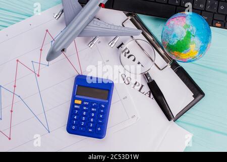 Bunch of office supplies on blue desk. Stock Photo