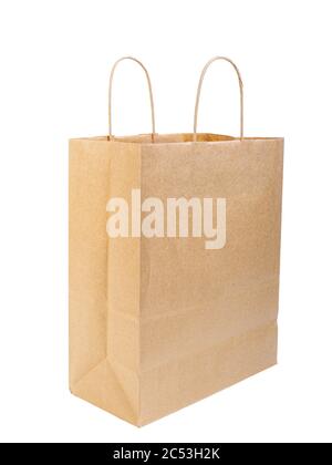 Plain paper bag with handles on a white background. Stock Photo