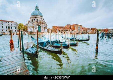 Gondola on Canal Grande with Basilica di Santa Maria della Salute in the background, Venice, Italy. Stock Photo