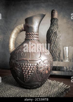 Ceramic wine jug made of red clay. Stock Photo
