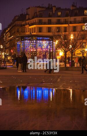 PARIS, FRANCE - FEBRUARY 23, 2020: People at evening in Nelson-Mandela garden, ex Jardin des Halles, near Forum de Halles mall Stock Photo