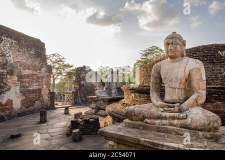 Buddha statues in dilapidated ruin of the old capital of Sri Lanka, Polonnaruwa Stock Photo