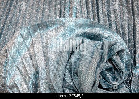 Metal glitter silver cloth background, close up. Trendy Metallic grey fabric texture. Gray sequins, sparkling sequined textile.Gray decorative Stock Photo