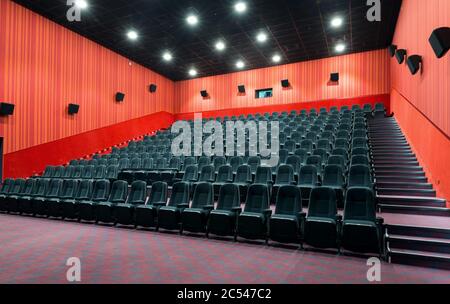 Moscow - July 21, 2014: Panoramic view of an empty cinema hall. Contemporary cinema auditorium design. Inside the comfortable theatre. Panorama of the Stock Photo