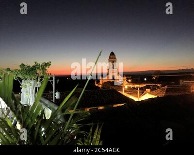 Catholic church in the center of Trinidad during sunset Stock Photo