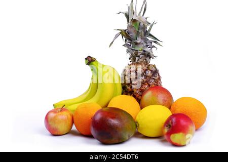 Citrus fruits, lemon, mango, banana, orange and pineapple on a white background Stock Photo