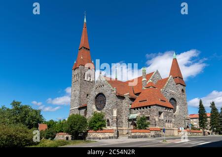 Historical stone church exterior in bright summer sunshine Stock Photo