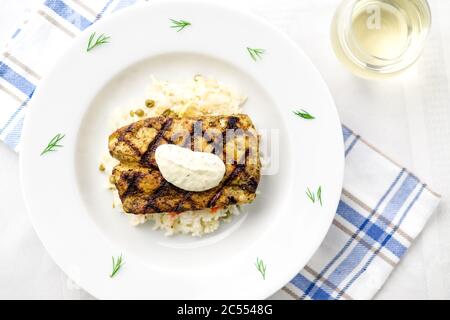 Seared mahi mahi fish fillet viewed from above. This lean tropical white fish is also known as common dolphinfish or dorado. Considered an healthy foo Stock Photo