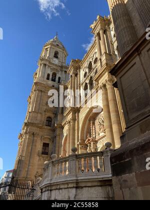 Vertical low angle shot of The Cathedral of Malaga in Spain captured during the daytime Stock Photo