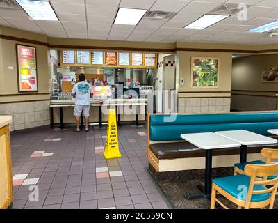 Orlando, FL/USA - 6/5/20:  A Wendy's interior with social distancing information on the tables. Stock Photo