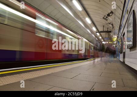 London Underground moving at peak hours Stock Photo