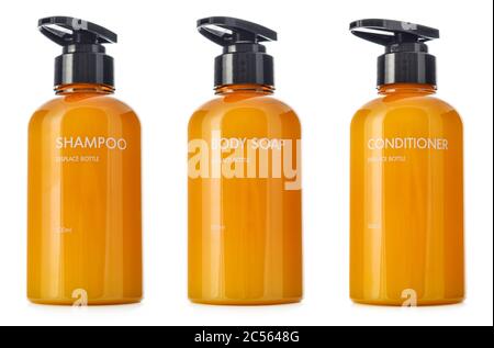Plastic orange bottles with dispenser pumps isolated on white background. Stock Photo
