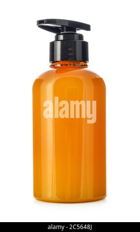 Plastic orange bottle with dispenser pumps isolated on white background. Stock Photo