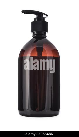 Plastic brown bottle with dispenser pumps isolated on white background. Stock Photo