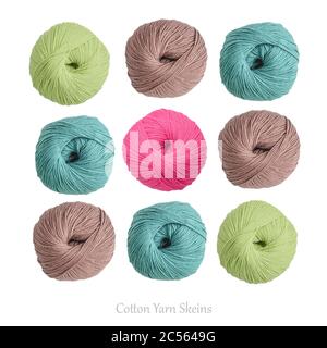 Pattern from cotton yarn skeins in different  colors isolated on white, top view Stock Photo